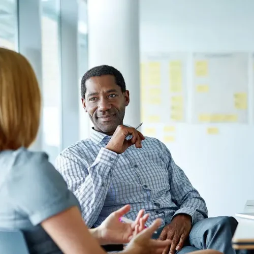 a-career-coach-meets-with-client-in-office-setting-business-discussion_2021-07-24-022013_enol